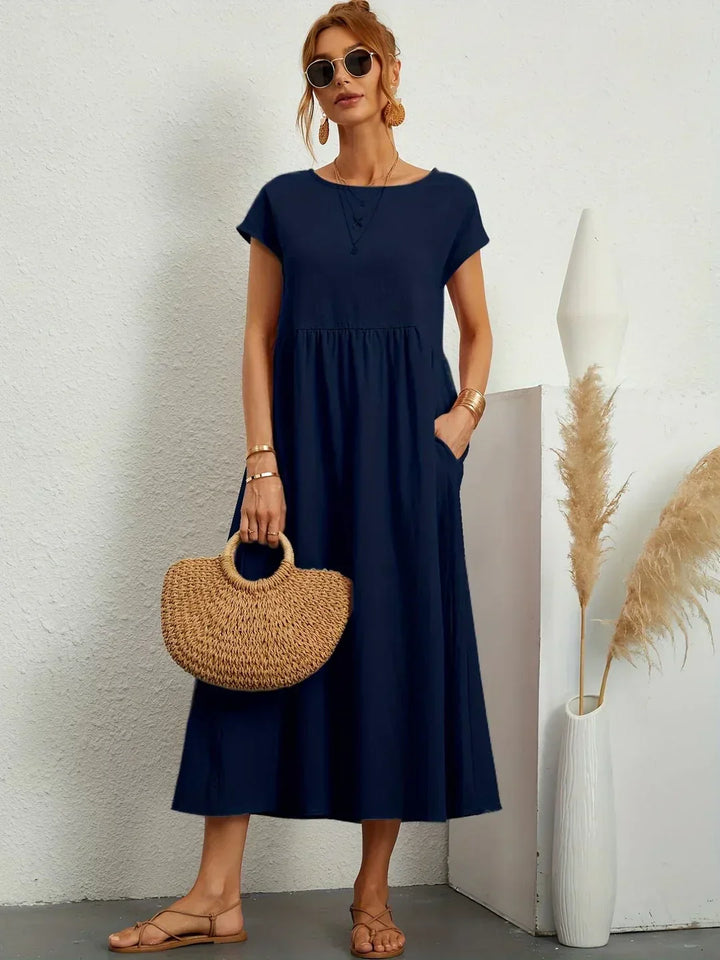Ilse | Midi jurk in tijdloze vloeibare elegantie