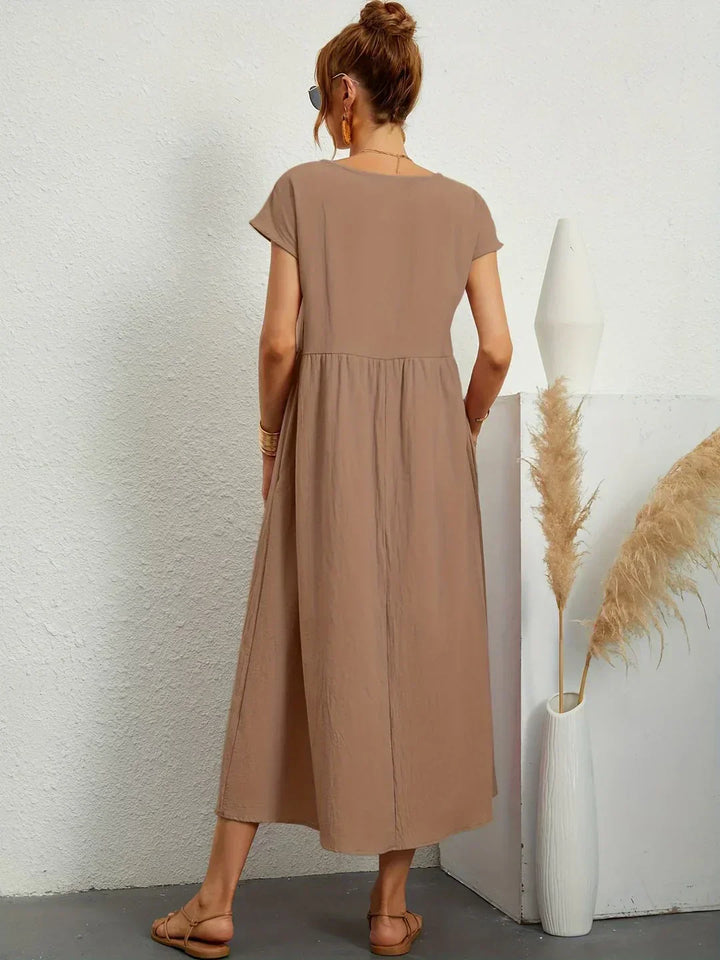 Ilse | Midi jurk in tijdloze vloeibare elegantie